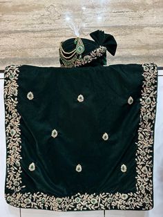 Dark green turban and stole velvet with white floral embrodiery motifs and rich embroidery white border. Website https://zorahinternational.com/ Green Velvet Dupatta With Resham Embroidery, Green Velvet Traditional Wear With Traditional Drape, Green Velvet Dupatta With Zari Work, Festive Green Velvet Dupatta, Green Embroidered Velvet Traditional Wear, Embroidered Green Velvet Dupatta, Green Velvet Traditional Wear For Festivals, Velvet Traditional Wear With Zari Work For Ceremonies, Green Velvet Dupatta In Traditional Drape