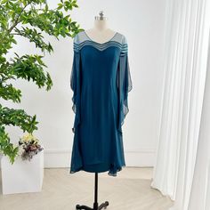 Blue Simple Chiffon Flying Sleeves Medium Evening Dress Back Zipper Hand Wash Blue Chiffon Evening Dress, Blue Chiffon Evening Dress For Cocktail, Elegant Blue Chiffon Evening Dress, Blue Chiffon Cocktail Evening Dress, Blue Chiffon Mother Of The Bride Dress, Blue Georgette Evening Dress For Formal Occasions, Elegant Blue Flowy Chiffon Dress, Blue Chiffon Cocktail Dress, Flowy Blue Chiffon Midi Dress