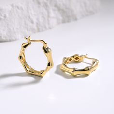 ♡ Share the Love FOLLOW on Instagram - @bealjewelry This unique design combines the bone motif with delicate fine details in a hoop earring crafted from 14-karat gold. Meticulously crafted with 14-karat gold, this earring offers a modern and chic appearance to complement your style. The bone details lend a distinctive character to the hoop earring, blending elegance with modern sophistication. The meticulous craftsmanship communicates that every detail has been thoughtfully considered and design Gold Nickel-free Hoop Earrings Fine Jewelry, Nickel-free Gold Hoop Earrings Fine Jewelry, Gold Nickel-free Fine Jewelry Hoop Earrings, Dainty Yellow Gold Metal Hoop Earrings, Real Gold Jewelry, Earrings Trendy, Fancy Jewellery, Follow On Instagram, Earring Crafts