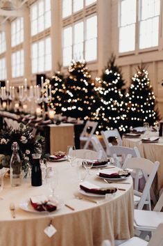 the tables are set with place settings for dinner