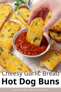 homemade cheesy garlic bread hot dog buns with dipping sauce in a bowl