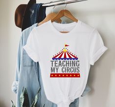 a t - shirt that says teaching my circus on it