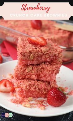 strawberry crunch cake brownies with vanilla glaze are stacked on top of each other