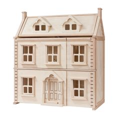 a wooden doll house with windows and doors