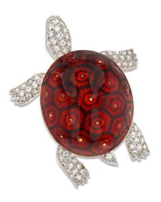 Rich red enamel etched in a striking tortoiseshell pattern distinguishes this charming turtle brooch by legendary French jeweler Boucheron. The shell is accented by dozens of sparkling white diamonds forming the turtle's head and limbs, all set in 18K gold. 1 4/5" length Golconda Diamond, Boucheron Jewelry, Turtle Brooch, Jewelry For Sale, Antique Brooches, A Turtle, Gold Brooches, Fine Jewels, Animal Jewelry