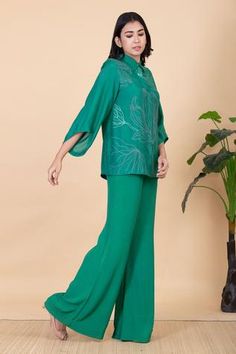 Shop for Chambray and Co. Green All Weather Pure Silk Emma Embroidered Shirt And Wide Legged Pant Set for Women Online at Aza Fashions Elegant Green Floral Print Bottoms, Green Floral Print Pant Set For Spring, Spring Workwear Long Sleeve Palazzo Set, Elegant Green Embroidered Pant Set, Elegant Palazzo Set For Work In Spring, Spring Green Workwear Pant Set, Elegant Spring Palazzo Set For Work, Green Pant Set For Spring Workwear, Elegant Spring Workwear Palazzo Set