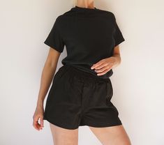 IMPORTANT to US CUSTOMERS! Now all orders to USA will be shipped by DHL Express (3-9 days) to avoid the unpleasant delays. Please leave your phone number when you order. Thank you! ---- Vintage lightweight black cotton shorts dated from 1960-1961. Made in Germany. Side slits. Love the back pocket. Light & casual. Super easy to wear. In excellent condition.  We currently have a small group of these available, each one is unique.  Measurements are taken flat. Fit from 26" (unstretched) to 32" wais Black Cotton Shorts, Elastic Shorts, Pocket Light, Short Waist, Small Group, Dhl Express, Cotton Shorts, Short Outfits, Black Cotton