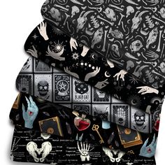 four sheets of black and white designs with hands, skulls, and other things on them