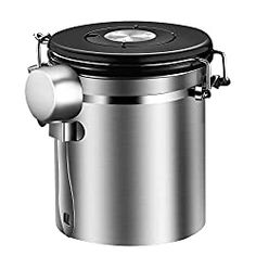 a stainless steel trash can with a lid on the side and an outlet in the middle