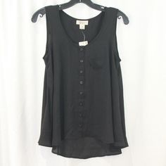 All Items Are 3 For $20 Style & Co Women's Black Sleeveless Button Up Blouse. Size Petite Small, New With Tags. Semi Sheer, Chiffon. 100% Polyester. Armpit To Armpit Approx. 17.5'' Length (Middle Back) Approx. 24.5'' 006468-33 Black Casual Buttoned Tank Top, Casual Black Buttoned Tank Top, Black Summer Tank Top With Button Closure, Black Button Closure Tank Top For Summer, Casual Black Tank Top With Button Closure, Body Blouse, White Peasant Blouse, White Floral Blouse, Tie Neck Tops