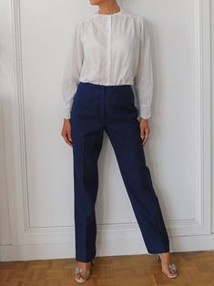 "80s French winter military pants in navy blue. Sturdy, well cut and chic.  Perfect Unisex tailored pants Material: Wool blend Estimated size: XS - S Measurements: waist: 68cm/ 26\"8 Hip: 84cm/33\"1 Length at the side seam: 103cm / 40\"1 Please note that most of our vintage items are not new and may have minor flaws due to pre-loved wear We are advocates of buying used and hope you can appreciate this garment and its character. items are pre-handwashed/de-pilled/mended if needed and any major fl Retro Trousers For Workwear, Retro Straight Work Pants, Retro Straight Pants For Work, Navy High-waisted Pants For Work, Navy High-waisted Cotton Pants, Navy High Waist Cotton Pants, Retro High-waisted Workwear Bottoms, Retro High-waisted Bottoms For Workwear, Retro High Waist Bottoms For Work