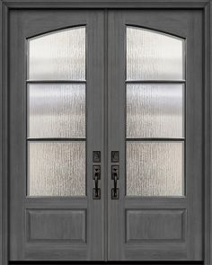 a double door with two sidelights and glass panels