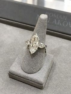 a diamond ring is on display at the museum