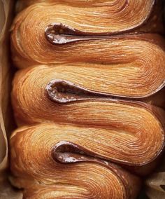 some very tasty looking pastries in a brown paper bag