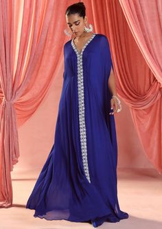 Embellished full length draped kaftan. Kris Jenner Kaftan, Embellished Draped Dress For Eid, Elegant Draped Kaftan For Festive Occasions, Elegant Draped Kaftan For Festive Season, Elegant Draped Festive Kaftan, Draped Kaftan For Wedding, Blue V-neck Kaftan For Party, Festive Royal Blue Kaftan, Blue Embellished V-neck Kaftan