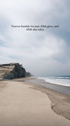 the beach is empty and there are footprints in the sand near the water, with an inspirational quote above it