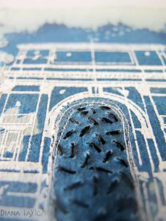 a close up view of a tire on a blue and white background