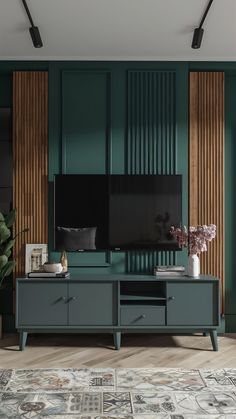 a living room with dark green walls and wooden paneling on the wall, two large televisions in front of them