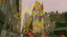 the new york times square sign is lit up with neon lights and people walking down the street