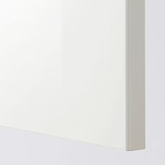 the corner of a white wall that has been painted