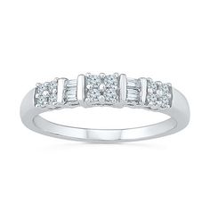 Ring Style: BandsDiamond Clarity: I2-I3Setting: ProngStone Cut: RoundDiamond Color: I-JMetal Color: WhiteRounded Carat Weight: 1/4 Ct. T.w.Band Width: 2mmCare: Wipe CleanAuthenticity: Natural DiamondBirthstone: April BirthstoneMetal: Sterling SilverCountry of Origin: Imported White Diamond Ring With Round Band And Accents, Classic White Stackable Rings For Promise, Classic White Stackable Rings With Pave Setting, White Half Eternity Diamond Ring For Anniversary, Classic White Cluster Ring For Promise, White Classic Cluster Promise Ring, White Diamond Half-eternity Ring, White Stackable Promise Rings With Prong Setting, White Diamond Ring With Pave Setting For Anniversary