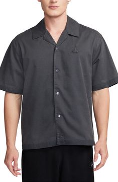 Roomy and relaxed, this camp shirt made with breathable cotton sports tonal front snaps and an enzyme wash that makes it look and feel like an old favorite. 27" length; 44" chest (size Medium) Front snap closure Notched collar Elbow-length sleeves 65% polyester, 35% cotton Machine wash, tumble dry Imported Nordstrom x Nike: A curated lifestyle destination where fashion is the ultimate sport Solid Color Cotton Camp Shirt With Camp Collar, Solid Cotton Camp Shirt With Camp Collar, Solid Cotton Camp Collar Shirt, Solid Color Cotton Camp Shirt, Cotton Camp Shirt With Snap Buttons, Cotton Shirt With Snap Buttons And Camp Collar, Collared Cotton Camp Shirt With Snap Buttons, Casual Tops With Snap Buttons And Camp Collar, Cotton Collared Camp Shirt With Snap Buttons