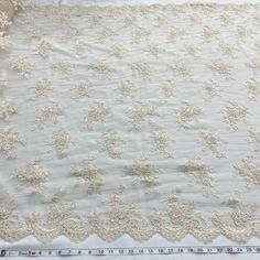 Introducing a truly unique, high-end collection of exquisite Beaded & Corded bridal lace fabric, embroidered on 100% Polyester net mesh. A perfect option for wedding dresses, evening gowns, quinceanera dresses, and dance costumes, this fabric comes in 5 colors and is approximately 54" wide. Boasting a gorgeous corded or beaded couture lace with exquisite pearl and sequin detailing, this fabric is sure to leave a lasting impression. The perfect decorative and elegant corded or beaded special occa Festive Pearl Embroidered Lace Fabric, Beaded Couture, White Beaded Lace Embroidered Fabric, Red Sequined Lace Embroidered Fabric, Silver Embroidered Lace Sequin Fabric, Quinceanera Crown, Pink Rhinestone-embroidered Lace Fabric, Corded Lace Fabric, For Wedding Dresses