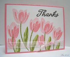 a card with pink flowers on it and the words thanks written in black ink,