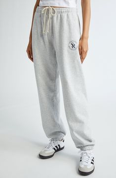 Hang out after workouts in these heathery sweatpants stamped with a monogram logo on one leg. 28" inseam; 10" leg opening; 11" front rise; 15" back rise (size X-Small) Elastic waist Side-seam pockets 97% cotton, 3% polyester Machine wash, tumble dry Made in the USA Asian & Pacific Islander Owned/Founded Athleisure Jogging Bottoms With Logo Detail, Athleisure Bottoms With Logo Detail For Jogging, Athleisure Bottoms With Logo For Jogging, Athleisure Bottoms For Jogging With Logo Detail, Sporty Jogging Bottoms With Logo Detail, Sporty Bottoms With Logo Detail For Jogging, Sporty Logo Detail Bottoms For Jogging, Athleisure Joggers With Logo Detail For Jogging, Athleisure Joggers With Logo Detail For Loungewear