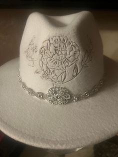 Beautiful custom fedora cowboy hat.  One of a kind, wrapped in Swarovski crystals. Elegant Adjustable Fedora For Western-themed Events, Western Fedora Hat For Wedding, Western Style Fedora For Party, Kentucky Derby Rhinestone Hat With Short Brim, Short Brim Rhinestone Hat For Kentucky Derby, Rhinestone Short Brim Hat For Kentucky Derby, Western Style Fedora With Curved Brim For Parties, Western Fedora With Curved Brim For Parties, Rhinestone-embellished Short Brim Hat For Kentucky Derby