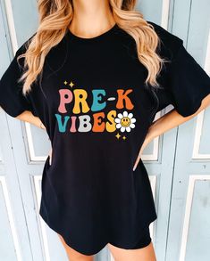 Pre-K Grade Vibes Shirt, Teacher's Day Sweatshirt For Women, Back To School Themed Hoodie, School Themed Sweater, Student Tee, Teacher Gift Explore endless possibilities in our store! From unique print-on-demand gifts to striking shirts, hoodies, and sweatshirts, our collection suits every taste. Immerse yourself in a blend of art and functionality, where each item tells a story. Step into a haven where your unique style finds the perfect match. Welcome to a print-on-demand shopping experience tailored to your individuality! 🎑 Review the Photos: Please carefully review all the photos of the items you're interested in. 👕 Select Size and Color: Choose the size and color of the shirt. If you want the exact item shown in the photo, feel free to contact us. 📝 Note on Colors: Different shirt Black Letter Print Fun Sweatshirt, Fun Black Sweatshirt With Graphic Print, Women Back, Hoodie Mockup, Sweatshirt For Women, Teacher Gift, Endless Possibilities, Unique Print, Perfect Match