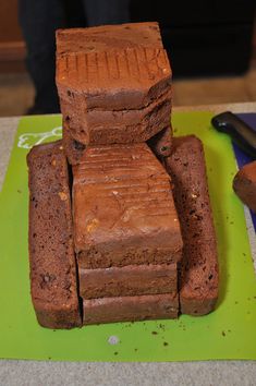 there is a cake made to look like a car on top of some blocks of chocolate