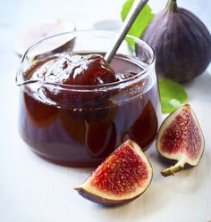 figs and jam on a plate with a spoon