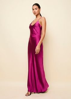 The Selena Satin Dress is an elegant slip dress featuring a scoop neck and flows seamlessly into a maxi length skirt. Complete with a hidden zipper to give it the perfect fit. Pair with one of our cashmere sweaters. Elegant Slip Dress, Selena Dresses, Magenta Dress, Solid And Striped, Knitwear Dress, Solid & Striped, Satin Dress, Matching Dresses, Xl Dress