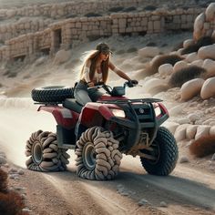 a woman riding on the back of an atv