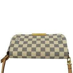 Item Details: Indulge in timeless elegance with the Louis Vuitton Favorite MM Damier Azur. This luxury handbag effortlessly combines iconic style and practicality for a statement accessory that transcends trends. Model: Favorite MM Style: Crossbody Bag Material: Damier Azur Color: White Made: France Date Code: DU4114 Made year: 2014 Measurements: W 9" x D 2" x H 5" Accessories: Strap and Chain. Condition Detail: Very Good - The Item is gently used and has very light corner rubbing, The leather has dirt marks, some inside stain marks, and slight signs of use on the hardware. The item is without any unpleasant smell. Please check the details and pictures before purchasing.Please do not hesitate to ask questions regarding our products or services, we will be more than happy to serve you with Louis Vuitton Favorite Mm, White Louis Vuitton, Favorite Mm, Louis Vuitton Favorite, Iconic Style, Balenciaga Designer, D 2, Casual Backpack, White Bag