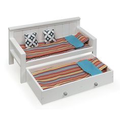 a toy bed with two drawers underneath it