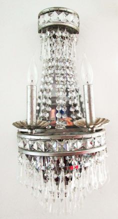 a crystal chandelier hanging from the ceiling