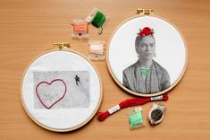 two embroidery hoops with pictures and thread on them