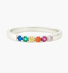 Meet our Mini Rainbow Band Ring- this whimsical piece is adorned with an arc of meticulously selected CZ stones, each shimmering with the joyous hues of the rainbow. Perfect for the color-loving daydreamer, this ring is more than an accessory—it's your very own piece of wearable joy. Adjustable Rainbow Stackable Jewelry, Rainbow Gemstone Jewelry In Sterling Silver, Adjustable Rainbow Birthstone Jewelry, Adjustable Rainbow Gemstone Ring, Adjustable Multi-stone Rainbow Jewelry, Everyday Rainbow Round Jewelry, Rainbow Multi-stone Birthstone Ring For Anniversary, Anniversary Rainbow Multi-stone Birthstone Ring, Anniversary Multi-stone Rainbow Birthstone Ring