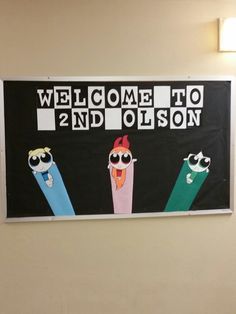 a bulletin board with cartoon characters on it and the words welcome to 2nd colson