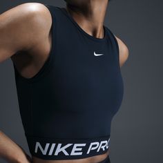 Get your sweat on in this cropped Nike Pro tank. Lightweight and stretchy, the smooth fabric dries quickly to help you stay ready when your workout heats up. With a body-hugging fit and soft jacquard elastic band at the hem, you can feel secure as you crush your goals. Nike Running Clothes, Cropped Nike, Nike Pro Women, Clothes Tops, Confident Style, Nike Tshirt, Women Lifestyle, Running Clothes, Nike Pros