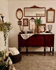 a living room filled with furniture and mirrors