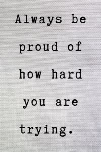 an old typewriter with the words, always be proud of how hard you are trying