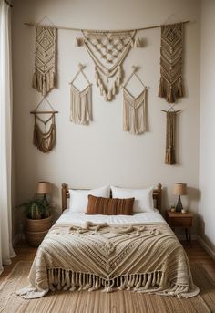 a large bed sitting in a bedroom next to a wall mounted with macrame