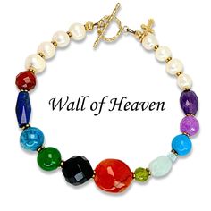 "The Wall of the city of Heaven is built on foundation stones inlaid with twelve gems... and the twelve gates were twelve pearls... and the great street of the city was of pure gold." Revelation 21:19-21  The Wall of Heaven Bracelet is hand-strung using the genuine gemstones in Revelation 21:19-21, genuine pearls to represent the solid pearl gates and finished in gold for the streets of gold!  AND the toggle clasp is made in Israel!  A visual reminder of the reality and beauty of our eternity in Heaven.  Each bracelet comes elegantly gift-boxed to preserve this heirloom piece with a wallet-sized story card listing the verses each bead symbolizes. For The Streets, Revelation 21, Pure Gold, Toggle Clasp, Charm Bracelets, The Streets, Wedding Shop, The City, Jewelry Bracelets