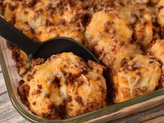 a casserole dish with meat and cheese on it, ready to be eaten