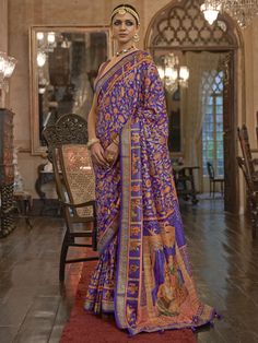 Introducing our gorgeous purple printed patola silk festival wear saree with a blouse, the perfect outfit to celebrate all your upcoming festivals, events, and special occasions. Made from high-quality silk fabric, this saree features stunning print work, foil zari work, and Swarovski detailing for a touch of elegance and glamour.
The set includes a beautiful purple saree measuring 5.50 meters, along with unstitched blouse material in a matching silk fabric. The silk blouse showcases intricate z Purple Saree, Patola Saree, Turquoise Blue Color, Art Silk Sarees, Printed Saree, Blouse Material, Colored Highlights, Purple Silk, Traditional Sarees