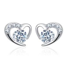 You will feel like you are wearing expensive diamond earrings when you put these elegant studs on! Made with 925 Sterling silver and white gold with clear cubic zirconia that sparkles like a diamond in the light These silver earrings are exquisite, but are also sturdy and built for longevity. Perfect for every occasion Sterling Silver Heart Earrings, Silver Heart Earrings, Purple Diamond, Heart Shaped Earrings, Heart Shaped Diamond, Heart Studs, Paros, Heart Earrings Studs, Diamond Fashion