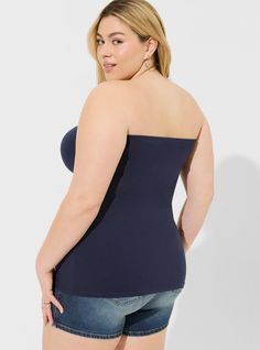 FIT Model is 5'11” wearing size 1. Measures 30' from shoulder (size 2). . MATERIALS + CARE Foxy knit fabric: Holds you in, smooths you out and doesn't ride up. Stretch level: Maximum. 95% cotton, 5% spandex. Machine wash cold. Tumble dry low. Imported. DETAILS Strapless neckline. Sleeveless. . The best plus size women's foxy strapless tube top tops in peacoat made of foxy. Rock your look from Torrid to Festivals like Coachella and Lollapalooza, a concert, a show, or just for fun! Stretch Off-shoulder Tube Top With Built-in Bra, Blue Seamless Bandeau Top, Fitted Strapless Seamless Top, Black Peacoat, Disney Leggings, 17 Black, Strapless Neckline, Shoes For Leggings, Tube Top